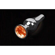 Пикантные Штучки, Серебристая анальная пробка с кристаллом - 8.5x3 см, оранжевый: Для кого Унисекс