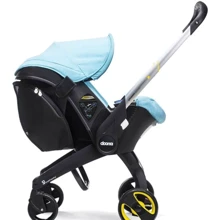 Карман Doona Snap on storage / black: Производитель Doona