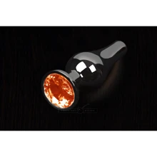 Пикантные Штучки, Маленькая графитовая анальная пробка с кристаллом - 8.5x3 см, оранжевый: Для кого Унисекс