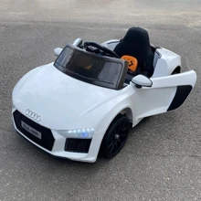 Електромобіль Kidsauto Audi R8 Spyder Style білий: Вид автомобіль