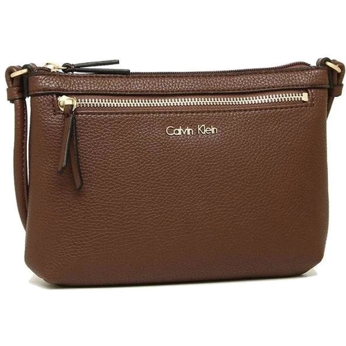 Женская сумка-пошет Calvin Klein коричневая (631620295135): Пол Женский