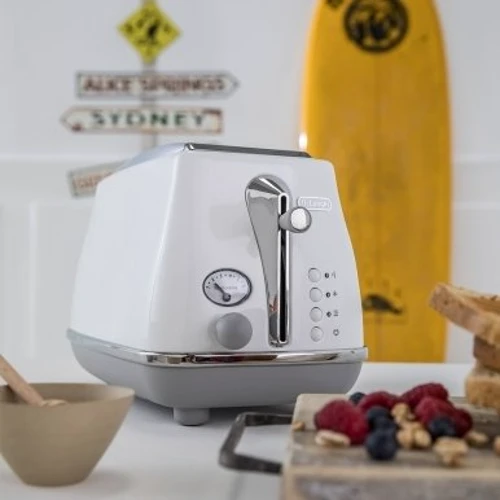 Тостер DeLonghi CTOC 2103 W: Съемный поддон для сбора крошек есть