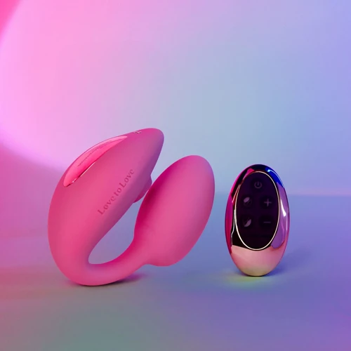 Виброяйцо с вакуумной клиторальной стимуляцией Love To Love Wonderlover Pink Passion