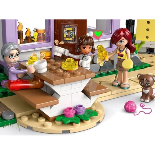 Конструктор LEGO Friends Домик и цветник пчеловодов 1161 деталь (42669) фото 11