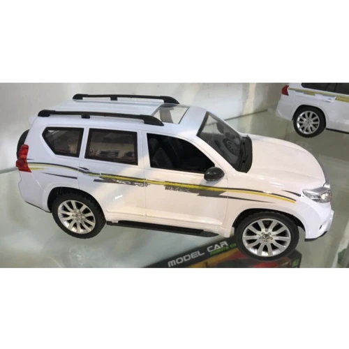 Машина LimoToy 1:12, р/у., акум., рез. колеса, 2 цвета, USB, свет (M 4916): Класс Джип