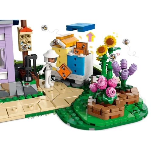 Конструктор LEGO Friends Домик и цветник пчеловодов 1161 деталь (42669) фото 10