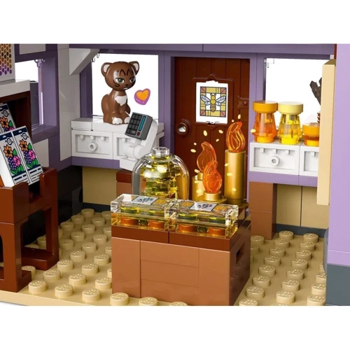 Конструктор LEGO Friends Домик и цветник пчеловодов 1161 деталь (42669) фото 12