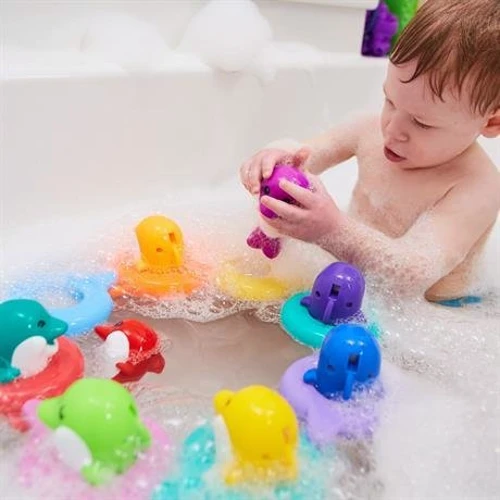 Игрушка для ванной Toomies Поющие дельфины До Ре Ми (E6528)