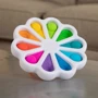 Іграшка тактильна кольорові пелюстки Fat Brain Toys dimpl digits (F275EN) фото 7