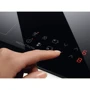 Варильна поверхня електрична Electrolux IPE3241KC: Розташування панелі спереду