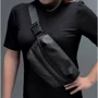 Жіноча сумка поясна Heys Puffer Mini Waist Bag Black чорна (30128-0001-00): Матеріал Полиэстер