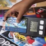 Настільна гра Hasbro Monopoly Монополія Бонуси без кордонів (рус) (E8978) фото 14