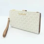 Жіночий клатч Michael Kors бежевий (MK0514W): Стать Женский