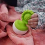 Прорізувач-неваляшка Fat Brain Toys dimpl wobl зелений (F2173ML): Колір зеленый