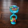 Прорізувач-брязкальце на присосках Fat Brain Toys pipSquigz Loops бірюзовий (FA166-1) фото 3