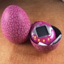 Игрушка электронный питомец Тамагочи в яйце динозавра UFT Eggshell Game (EggPink): Тип игровая консоль