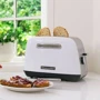 Тостер KitchenAid Classic 5KMT2115EWH: Съемный поддон для сбора крошек есть