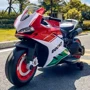 Детский электромотоцикл Bambi Racer Ducati бело-красный (M 5009E-1-3): Вид мотоцикл